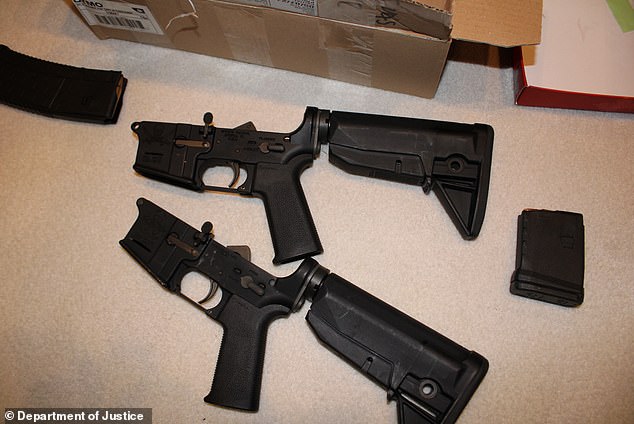 One of the guns had a 'red dot' sight that would have made it easier to pick out a target. In a dramatic moment, Homeland Security agent Gerard Gannon held up one of the .45 caliber pistols for the jury to see