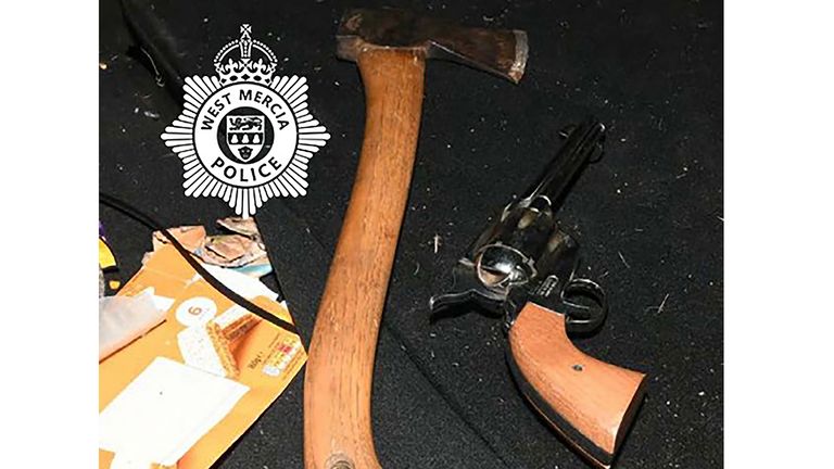 Weapons including an imitation pistol an axe were found in Craig Nunn's car.
Pic: West Mercia Police/PA