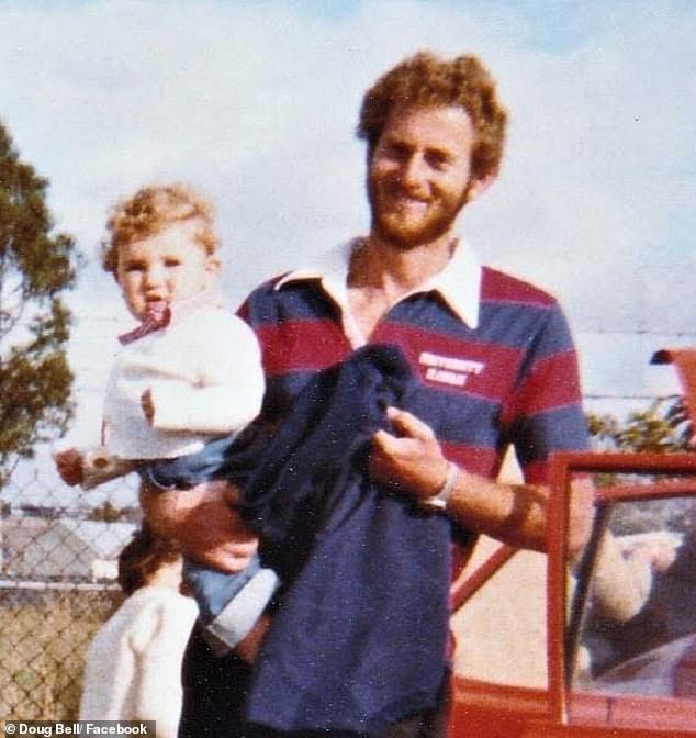 AFL great Robert Walls (pictured with one of his sons) was surrounded by his children and loved ones during his final moments
