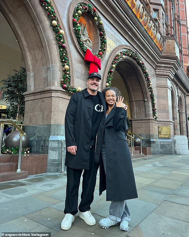 Crichton and his new Esegbona pose outside of Manchester's Midland Hotel after their engagement