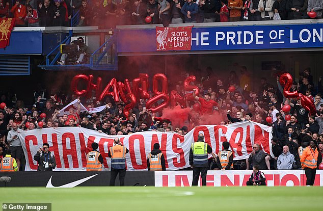 Balloons were held up spelling out the word ‘champions’ in the Liverpool away end on Sunday
