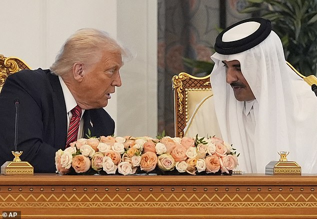 Middle East tour: President Donald Trump shakes hands with Qatar's Emir Sheikh Tamim bin Hamad Al Thani in Doha