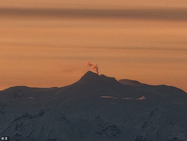 Earthquake swarms have hit near Alaska's Mount Spurr as scientists watching closely for an eruption. A recent image (pictured) taken this month shows the 11,000-foot-tall volcano emitting a large plume of steam, likely caused by magma heating underground water