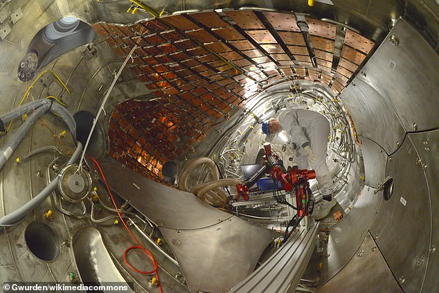 Wide-angle view inside the stellarator, showing stainless cover plates and the water-cooled copper backing plates - eventually covered by graphite tiles to function as armor to protect against plasma interactions