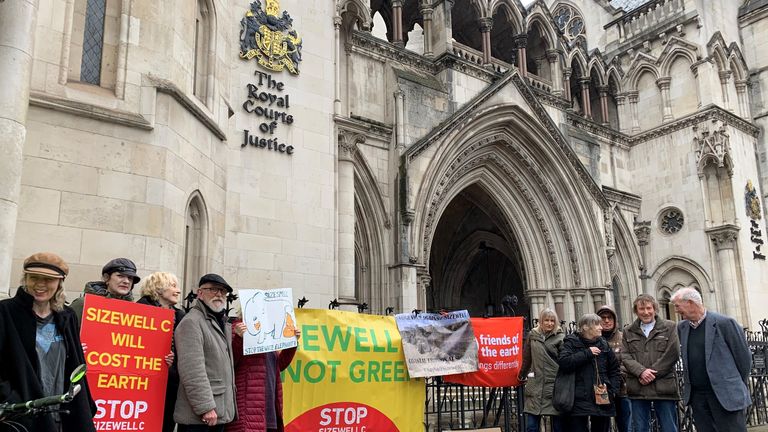Together Against Sizewell C campaigners outside the Royal Courts of Justice in London in 2023. Pic: PA 