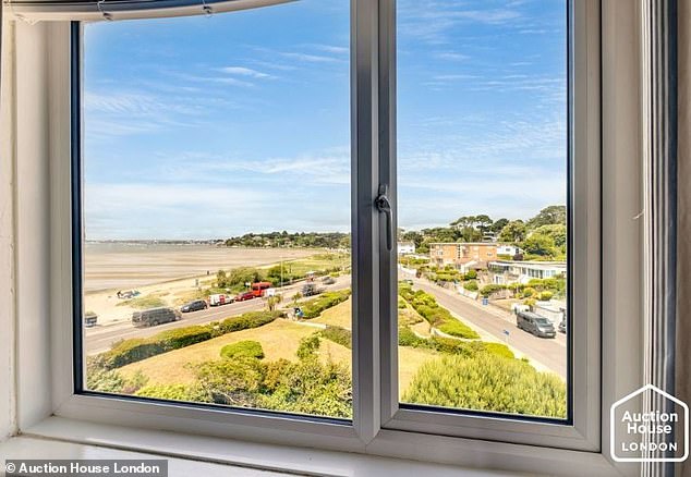 Great view: The two-bed apartment has an uninterrupted outlook over the beach