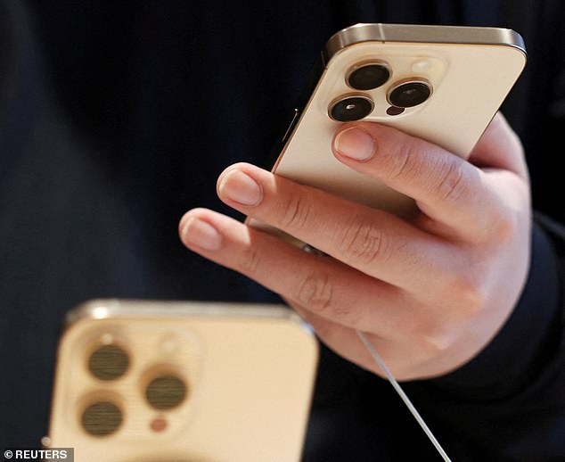 Apple's iOS 26 won't be compatible with several popular iPhones - although last year's iPhone 16 family are included. Pictured, an iPhone 16 Pro