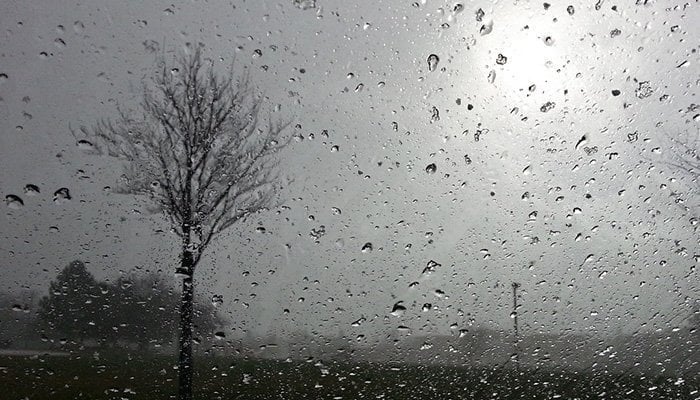 Representational image showing drizzle drops on a glass window. — APP/File