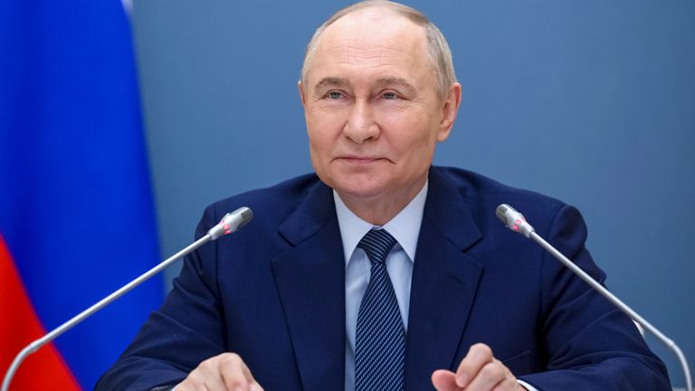 Vladimir Putin speaks to families and mothers awarded with the Mother Heroine title ahead.
Pic: Sputnik/AP