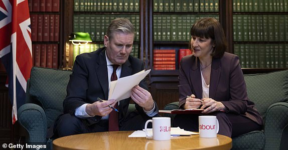 LONDON, ENGLAND - MARCH 5: Labour Party Leader Keir Starmer (L) and Shadow Chancellor Rachel Reeves (R) prepare for the Tory Spring Budget in Parliament on March 5, 2024 in London, United Kingdom. Rachel Reeves has said it would "take time" for a Labour government to "reverse the damage" the Tories have done to the economy over the past 14 years, she has also said "working people have been left worse off" by Conservative rule since 2010. The Spring Budget will be delivered to Parliament tomorrow by the current Chancellor Jeremy Hunt and is expected to be the last before the General Election. (Photo by Belinda Jiao/Getty Images)
