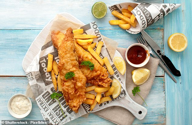 There's nothing quite like a fresh portion of fish and chips after a long day at the beach. From a side of mushy peas to a splash of vinegar, many Brits are very particular about how they enjoy this seaside staple. But according to one psychologist, the key to the perfect portion is much simpler (stock image)