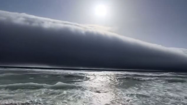 Images shared across social media showed a huge horizontal wall stretching from the horizon towards the shore, accompanied by a violent gust of wind when it reached land
