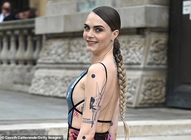 British model, Cara Delevingne has more than 20 tattoos to her name, including an abstract face on the back of her left arm