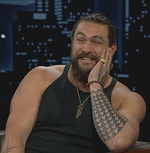 Jason Momoa is also fond or a traditional tattoo, with a tribal shark-tooth pattern down his foream, inspired by his family's 'aumakua - a god in Hawaiin mythology