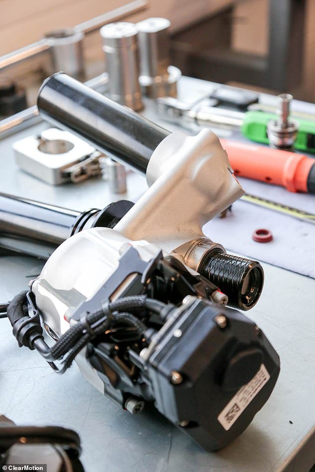 Each wheel is fitted with a ClearMotion active suspension system (pictured), which contains a compact motor, a hydraulic valve, and a computer to control the motion