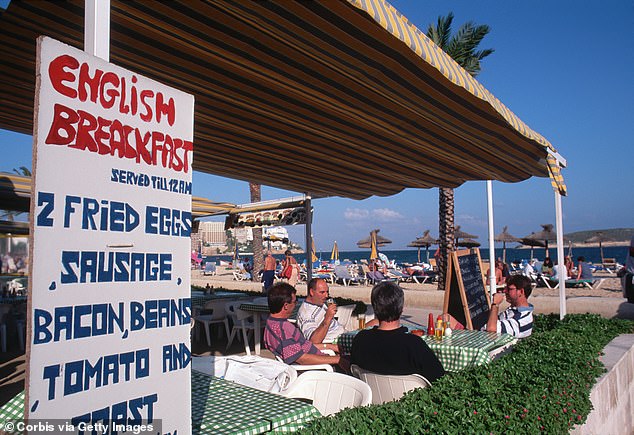 An iconic export: An establishment in Majorca, Spain advertises an English breakfast with the essential elements - egg, sausage, bacon, beans, tomato and toast