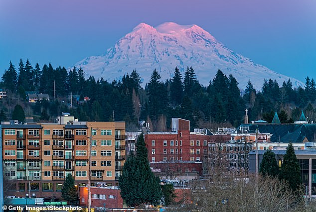 Mount Rainier (pictured) sits just 240 miles from the Axial Seamount in the Pacific Northwest