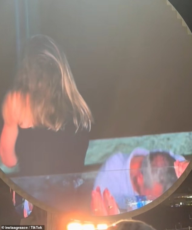 As the frontman panned his 'kiss cam' around the crowd at Gillette Stadium in Boston, the pair looked horrified to be seen by thousands on the big screen