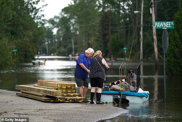 A Virginia Tech study has estimated that up to 225,000 people are at risk of death or displacement in sinking coastal communities (Stock Image)