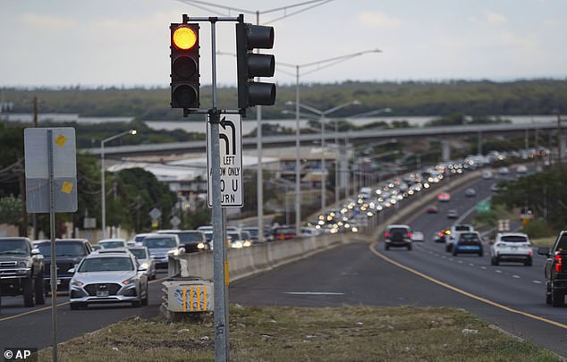 Hawaiian residents evacuated coastal areas as the island chain braced for impact, with water visibly receding - a sign of an incoming tsunami