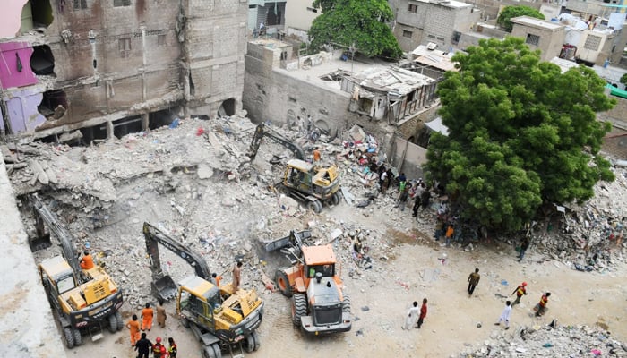 Rescue operation is underway after five-storey residential building collapsed, at Lyari area in Karachi on July 5, 2025. — PPI