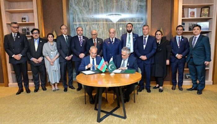 Deputy PM Ishaq Dar and Azerbaijani Economy Minister Mikayil Jabbarov formally signed the agreement in Shusha, Azerbaijan, on Friday. — APP