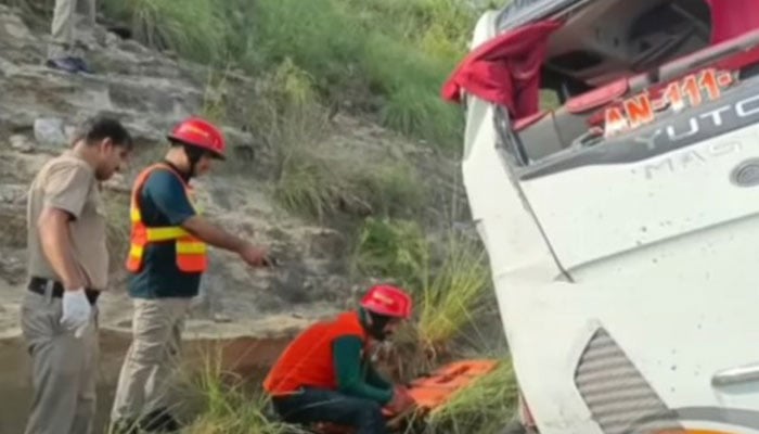 Rescuers engage in relief operation at the site of a bus accident in Chakwal on July 27, 2025 . — Screengrab via Geo News