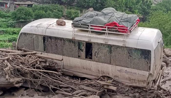 This handout photograph released on July 22, 2025 by the Government of Gilgit-Baltistan shows a stucked passenger van in the landslide hit area in Babusar, Gilgit-Baltistan region.— AFP