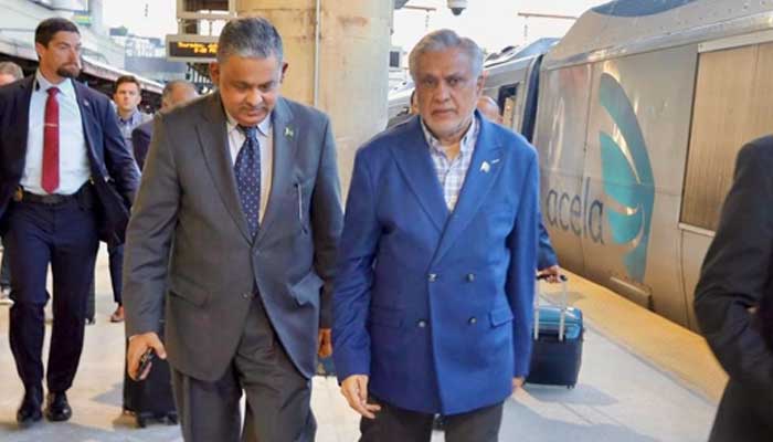 Ambassador of Pakistan to United States Rizwan Saeed Sheikh (Left) receives DPM Ishaq Dar upon his arrival in Washington, July 25, 2025. — X@ForeignOfficePk