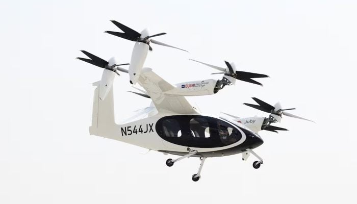A pilot operates an experimental Joby Dubai Aerial Taxi aircraft in Dubai United Arab Emirates, June 30, 2025. — Reuters