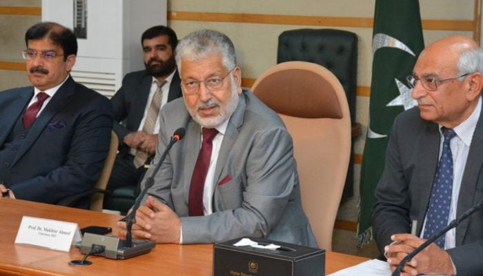 Chairman of the Higher Education Commission (HEC) Prof Mukhtar Ahmad (centre) speaks during an HEC meeting with national accreditation councils on March 12, 2025. — Facebook@HECPakistan2002
