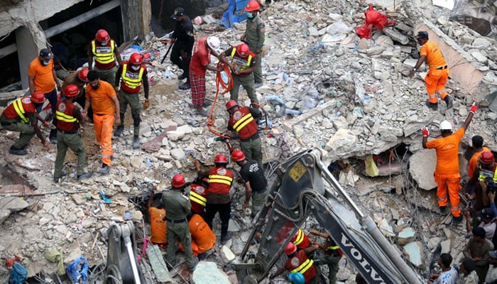 Rescue operation is underway after five-storey residential building collapsed, at Lyari area in Karachi on July 5, 2025. — PPI