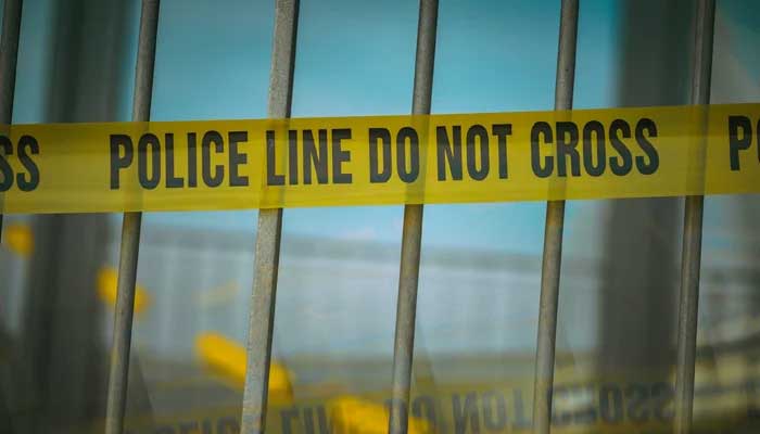 This representational image shows a crime scene tape. — Unsplash