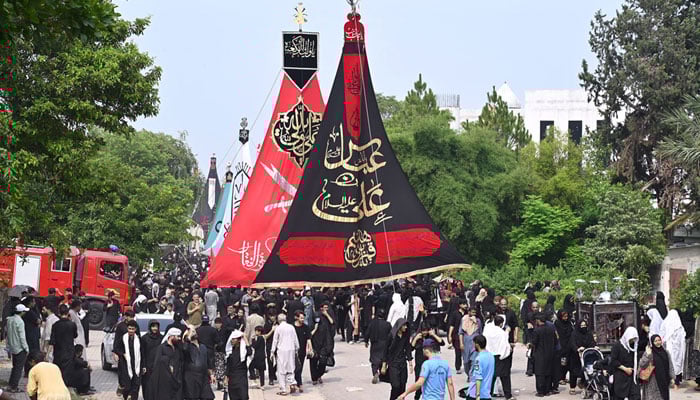 A large number of mourners participate in the main procession of 9th Muharram-ul-Haram, commonly known as Youm-e-Ashura, in the G-6 sector area in Islamabad on July 5, 2025. — APP