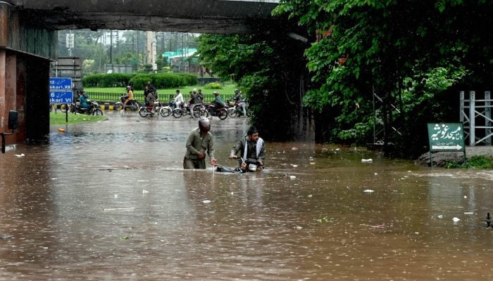 Airport Road near Rahimabad submerged in water due to heavy rain experienced in Rawalpindi, July 17, 2025. — APP