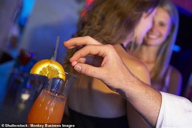 Spiking occurs when someone puts drugs into another person's drink without their knowledge or consent – often to make it easier to rape or sexually assault them (stock image)
