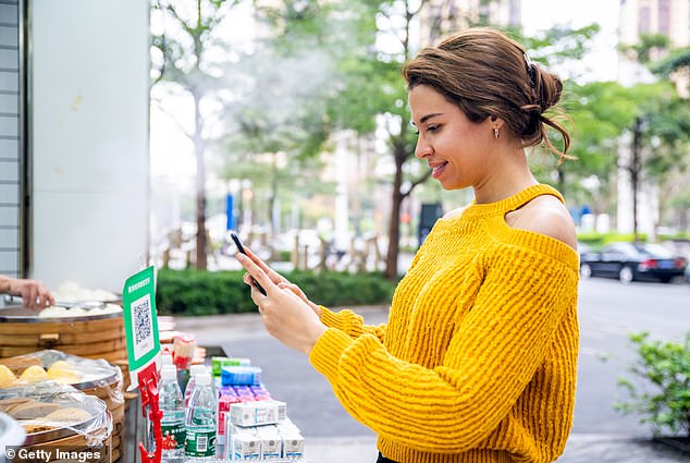 A QR code is a type of barcode that, when scanned with a smartphone, can open a website, display a message, or make a payment