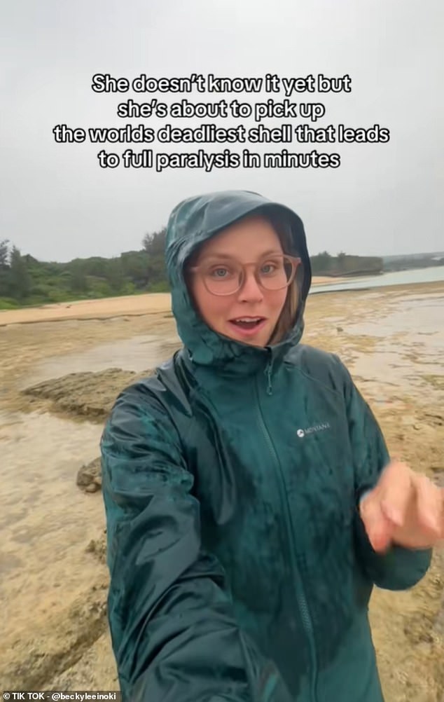 The video, shared by TikToker Beckylee Rawls, shows her walking along a beach in Okinawa in Japan when she picks up a pretty shell
