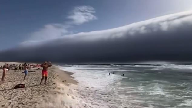 Beachgoers in Portugal were left terrified after spotting what appeared to a tsunami heading their way this week