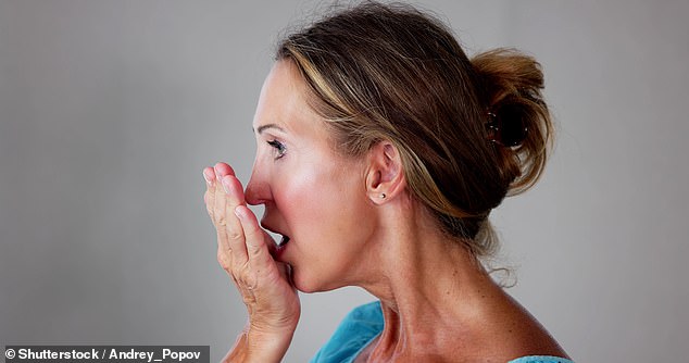 Research suggests breath odour may be an early warning sign of systemic health issues, and not just the result of too many cups of coffee (file image)