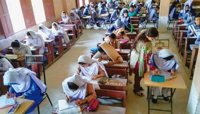File photo of students solving papers during annual exams. — PPI