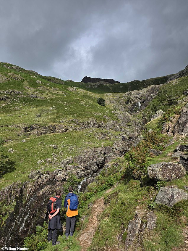 Before: The unedited image has two hikers in the foreground.