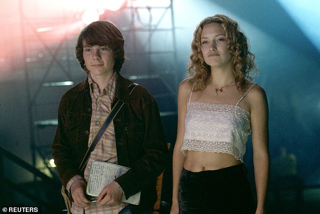 It's Almost Famous star Patrick Fugit! The actor memorably played William Miller in the blockbuster - seen with Kate Hudson, who played Penny Lane in the film