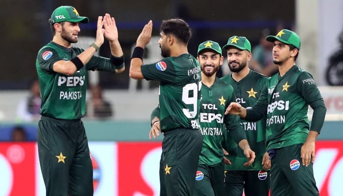 Haris Rauf celebrates with teammates after taking the wicket of Indias Suryakumar Yadav at Dubai International Cricket Stadium on September 21, 2025. — Reuters