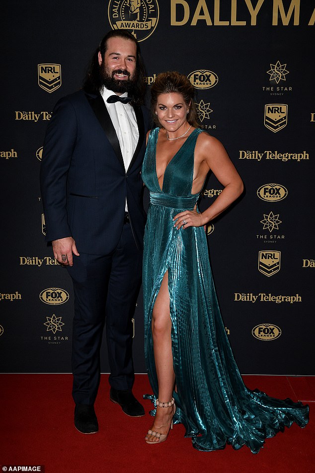 Woods (left) and Tallis have repeatedly clashed this year, notably after Woods slammed Billy Slater, calling the Queensland boss a 'grub' ahead of State of Origin II