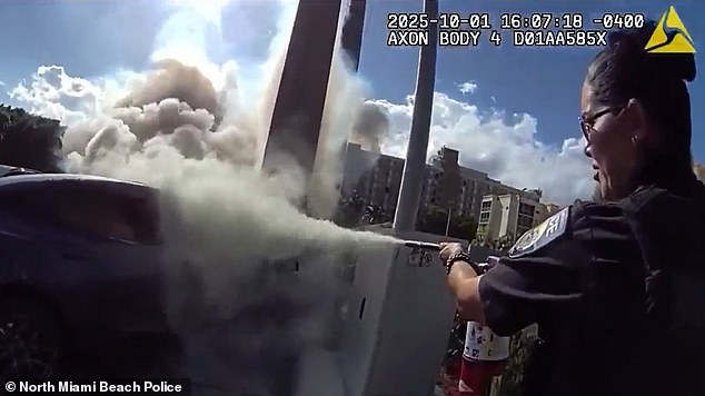 Police-worn body camera video shows how officers ran towards the wreck and tried to control the blaze until rescuers arrived. An officer beat on the rear windows with a baton, trying to break the glass, while another used a fire extinguisher on the flames
