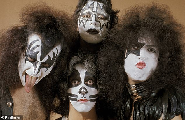 (L-R) Gene Simmons, Peter Criss (bottom), Ace Frehley (top), Paul Stanley posed in a KISS group shot in 1975; Stanley and Simmons said they were 'devastated' by Fraley¿s death