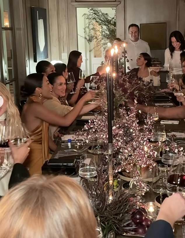 Guests clink glasses of Meghan's wine, which washed down an entirely plant-based dinner
