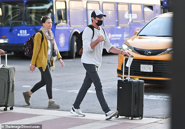 The couple strode across the street