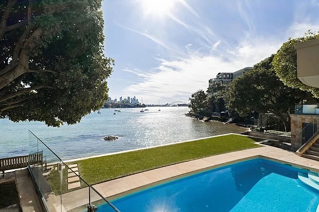 Interiors feature floor-to-ceiling windows, with each of the three levels offering balcony views of the harbour